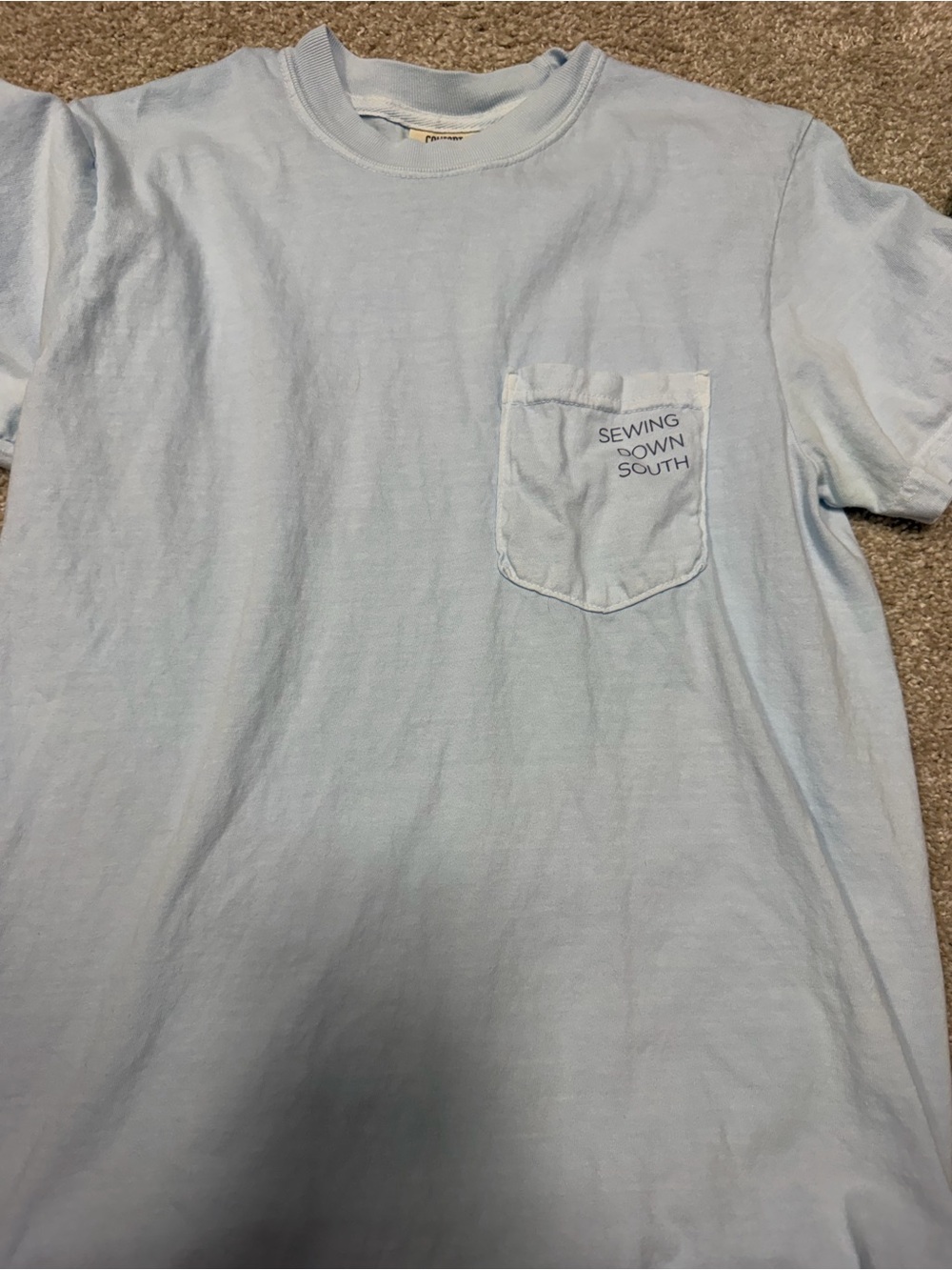 Light Blue Pocket Tee with 'Sewing Down South' Chest Print